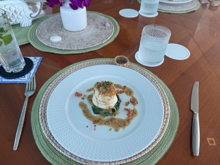 Chef Jim Ruch's Stuffed Dover Sole with whole grain mustard sauce over wilted Dragon Kale